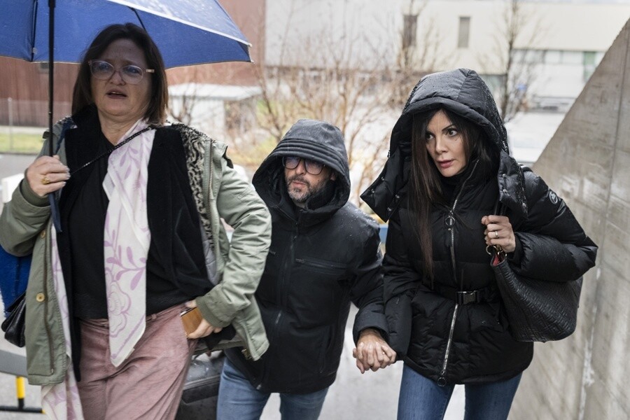 Family members of Swiss fire victims confront bar owners