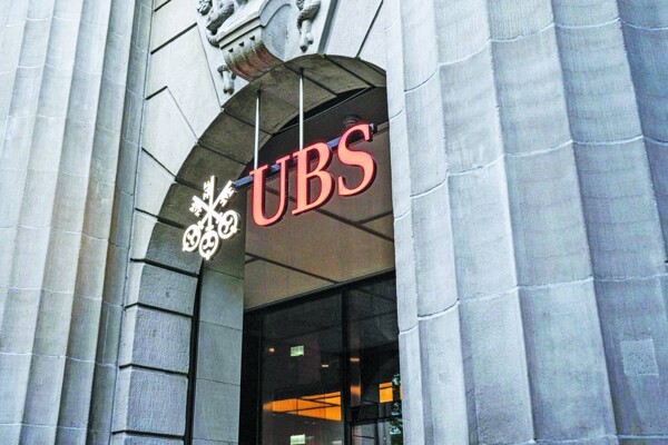 UBS announces quarterly profit growth and new share buyback program